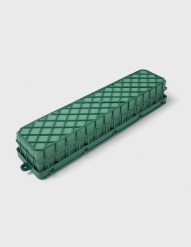 Soporte doble de esponja floral unidos por una rejilla técnica resistente, diseñados para crear arreglos de gran volumen con una hidratación equilibrada en ambos núcleos.