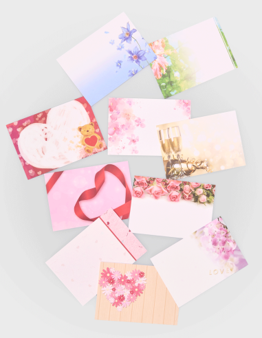 Conjunto de tarjetas de felicitación sencillas con diseños variados (Surtido 2), dispuestas de forma abanicada para mostrar sus motivos gráficos y texturas de alta calidad.