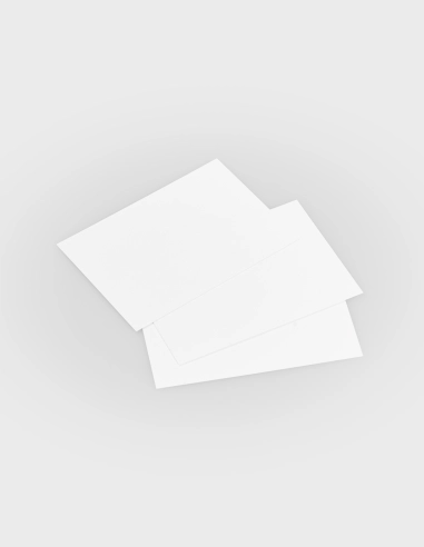 Set de tarjetas blancas lisas de alta calidad y gramaje superior, presentadas en un formato limpio que resalta su acabado mate y su versatilidad para la escritura manual.