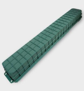 Soporte plástico alargado con capacidad para 3 bloques de esponja floral
